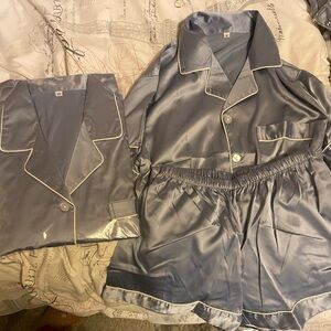 Brand new never worn dusty blue silk pajamas. Sizes run small so go a size up